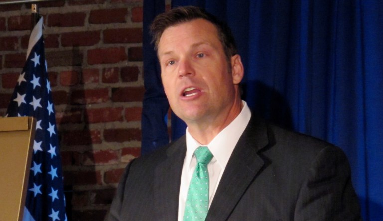 Democrats are calling on Kansas Secretary of State Kris Kobach, the vice chair of President Trump's voter fraud commission, to step down from the panel. (AP Photo/John Hanna)