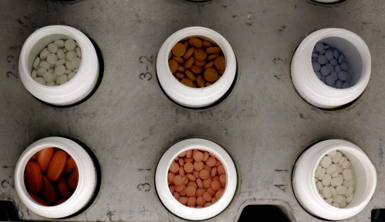FILE - This June 14, 2011 photo, shows various prescription drugs on the automated pharmacy assembly line at Medco Health Solutions, in Willingboro, N.J. (AP Photo/Matt Rourke)