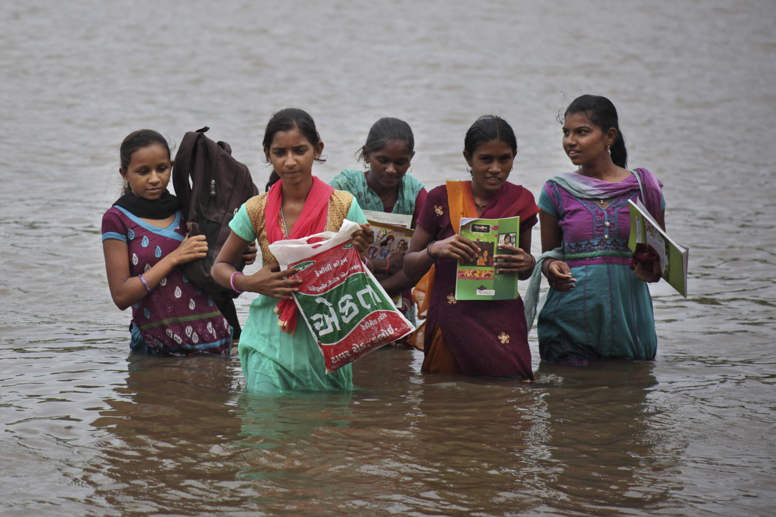 AP PHOTOS: Swimming to school in western India