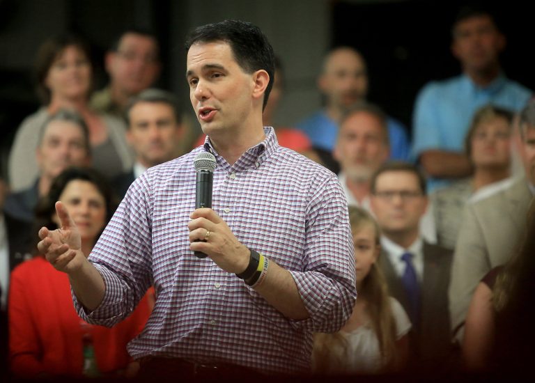 Wisconsin Gov. Scott Walker waves to supporters as he announces he is running for the 2016 Republican presidential nomination at the Waukesha County Expo Center, Monday, July 13, 2015, in Waukesha, Wis. (AP Photo/Morry Gash)