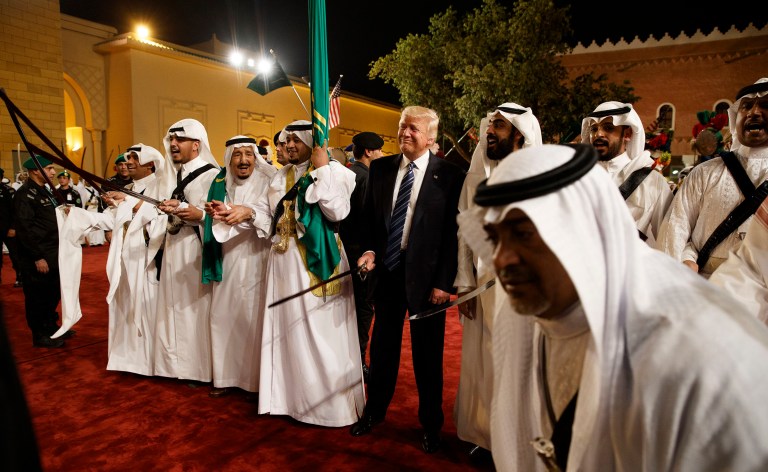 President Trump began a whirlwind weekend in which he was received a welcome fit for a king. (AP Photo/Evan Vucci)