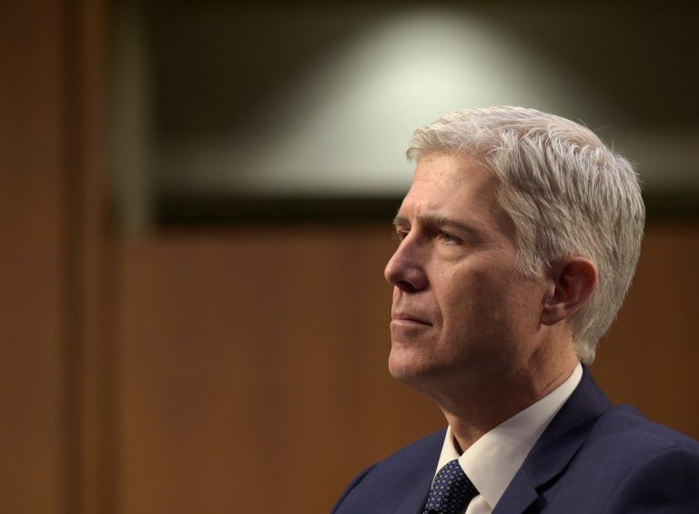 Unions fear nine-member court could side against them on dues for public-sector workers. (AP Photo/Susan Walsh)