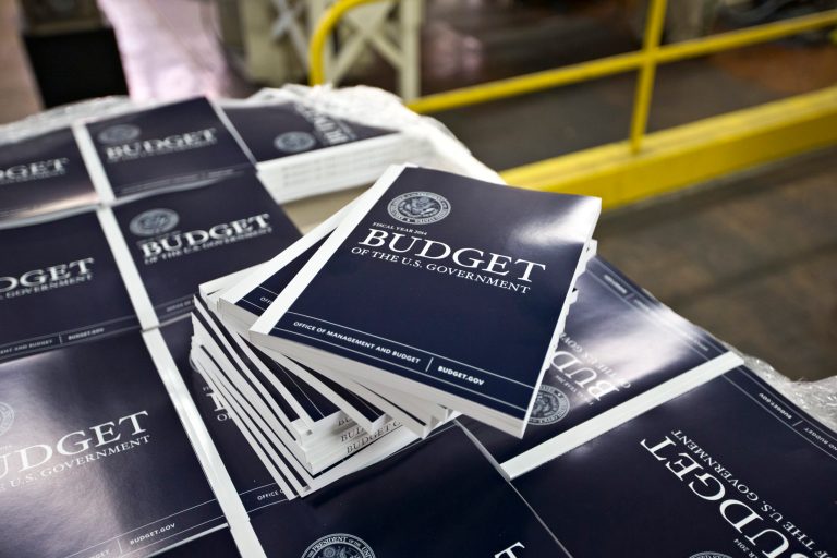 Copies of President Obama's proposed budget plan for fiscal year 2014 are prepared for delivery at the U.S. Government Printing Office in Washington on April 8, 2013. (AP Photo/J. Scott Applewhite)
