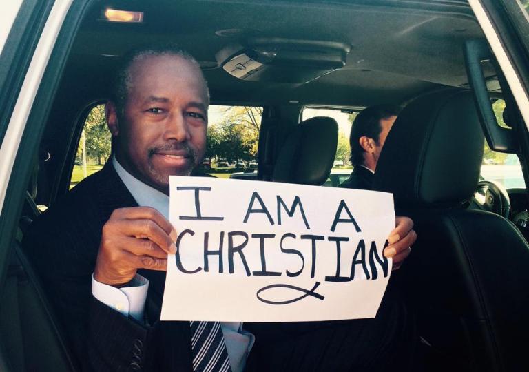 Carson reached out through Facebook in Twitter, in a picture holding up a sign reading 