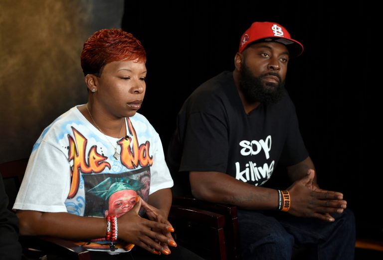 The parents of Michael Brown, Lesley McSpadden, left, and Michael Brown, Sr., right, take part in an interview with The Associated Press about the shooting death by a police officer of their unarmed 18-year-old son, Saturday, Sept. 27, 2014. (AP Photo/Susan Walsh)