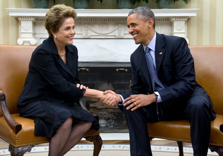 President Barack Obama shakes hands with Brazilian President Dilma Rousseff in the Oval Office of the White House in Washington, Tuesday, June 30, 2015. Obama and Rousseff aim to show they've moved beyond tensions sparked by the revelation nearly two years ago that the U.S. was spying on Rousseff. (AP Photo/Carolyn Kaster)
