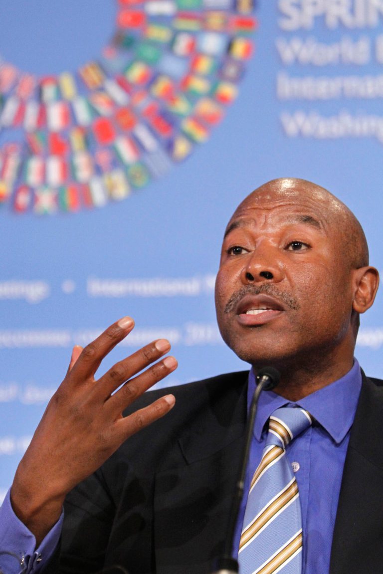 FILE - This file photo taken Thursday, April 14, 2011 of Lesetja Kganyago, Director General of South Africa's National Treasury, as he gestures during a news conference to discuss the G-24 meeting at the 2011 Spring Meetings of the World Bank/IMF in Washington. Kganyago has been appointed as the country's new reserve bank governor to replace Gill Marcus, who is retiring next month. (AP Photo/Jacquelyn Martin-File)