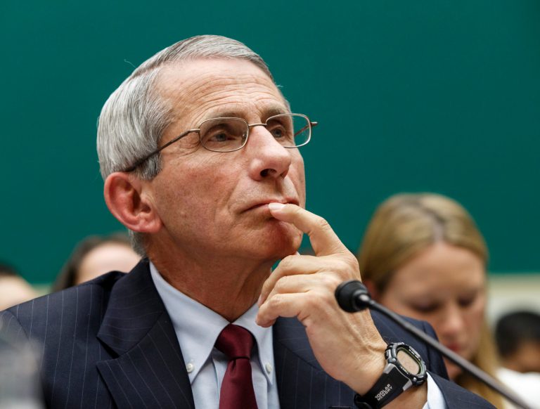 Dr. Anthony Fauci, director of The National Institute of Allergy and Infectious Diseases, testifies on Capitol Hill in Washington, Thursday, Oct. 16, 2014, as the House Energy and Commerce Committee's subcommittee on Oversight and Investigations held a hearing to examine the response to the Ebola outbreak and whether America's hospitals and health care workers are adequately prepared for Ebola patients.  (AP Photo/J. Scott Applewhite)