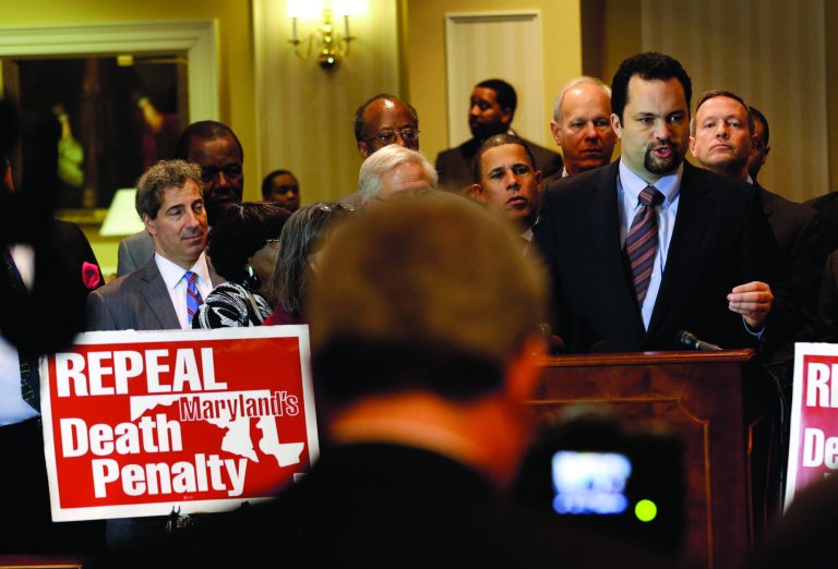 NAACP President Benjamin Jealous, right, speaks at a rally in support of repealing Maryland's death penalty in Annapolis, Md., Tuesday, Jan. 15, 2013. Maryland Gov. Martin O'Malley, who said he will be making repeal a priority, argued at the rally that the death penalty is a waste of resources that could be better used to fight crime in more productive ways. (AP Photo/Patrick Semansky)
