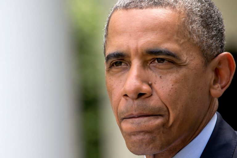 President Obama pauses while making an announcement about immigration reform, Monday in the Rose Garden of the White House in Washington. (AP/Jacquelyn Martin)