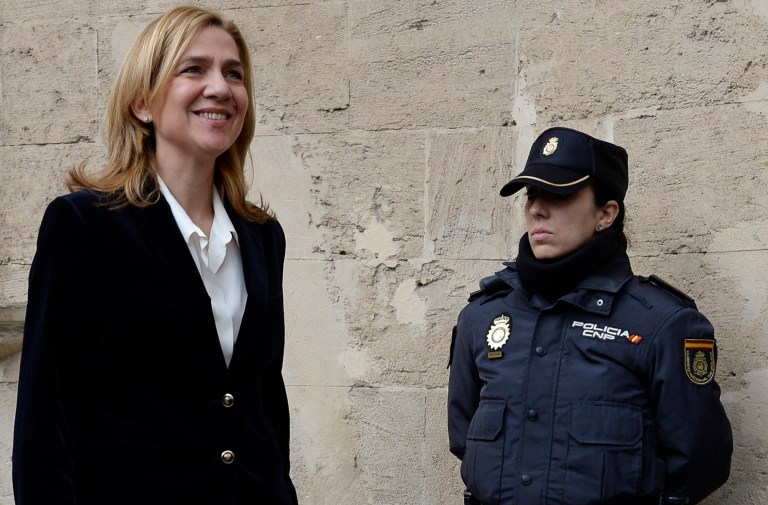 Spain's Princess Cristina arrives at the courthouse in Palma de Mallorca, Spain, Saturday, Feb. 8, 2014. Princess Cristina headed into court on Saturday for a historic judicial hearing to help determine whether she and her husband illegally used funds from a company to pay for expenses, including expensive parties at their modernist Barcelona mansion. (AP Photo/Manu Fernandez)