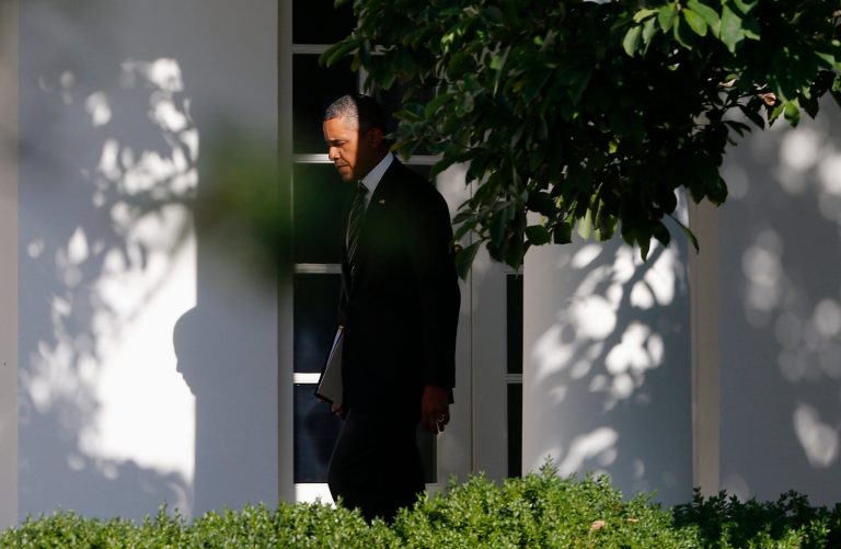   In this photo taken Aug. 22, 2013, President Barack Obama walks along the West Wing colonnade of the White House in Washington before traveling to New York and Pennsylvania. Nearly five years into his presidency, Obama confronts a world far different from what he envisioned when he first took office. U.S. influence is declining in the Middle East as violence and instability rock Arab countries. An ambitious attempt to reset U.S. relations with Russia faltered and failed. Even in Obama-friendly Europe, there's deep skepticism about Washington's government surveillance programs. (AP Photo/Charles Dharapak)  