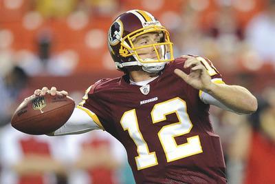 Nick Wass/AP
John Beck finished 10-for-21 for 108 yards and an interception in the Redskins'final preseason game, while veteran Rex Grossman never left the sideline Thursday.