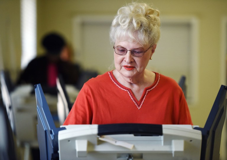 Among Republicans, men and women voted in equal numbers in Mississippi Tuesday night, and both sexes voted for Trump, 51 percent and 46 percent, respectively. (Joe Ellis/The Clarion-Ledger via AP)