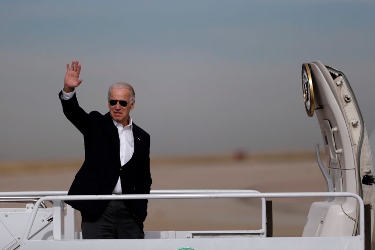 Vice President Joe Biden waves as he boards Air Force Two at Buckley Air Force Base, Saturday, Nov. 3, 2012, in Aurora, Co., en route Cleveland-Hopkins International Airport. (AP Photo/Matt Rourke)