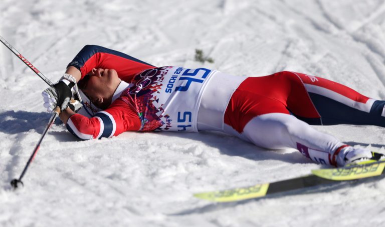 Norway's Marit Bjoergen catches her breath after the women's 10K classical-style cross-country race at the 2014 Winter Olympics, Thursday, Feb. 13, 2014, in Krasnaya Polyana, Russia. (AP Photo/Matthias Schrader)