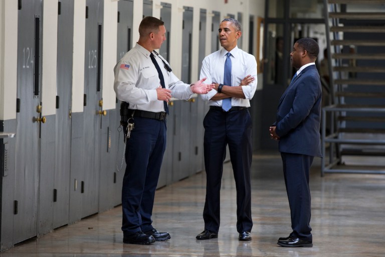 More than one-third of the 61 drug offenders affected by today's announcement were serving life sentences. (AP Photo/Evan Vucci)