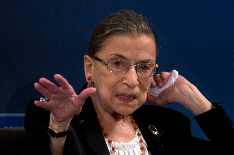 U.S. Supreme Court Justice Ruth Bader Ginsburg exits a stage after speaking with National Constitution Center president and CEO Jeffrey Rosen at the museum Friday, Sept. 6, 2013, in Philadelphia. (AP Photo)