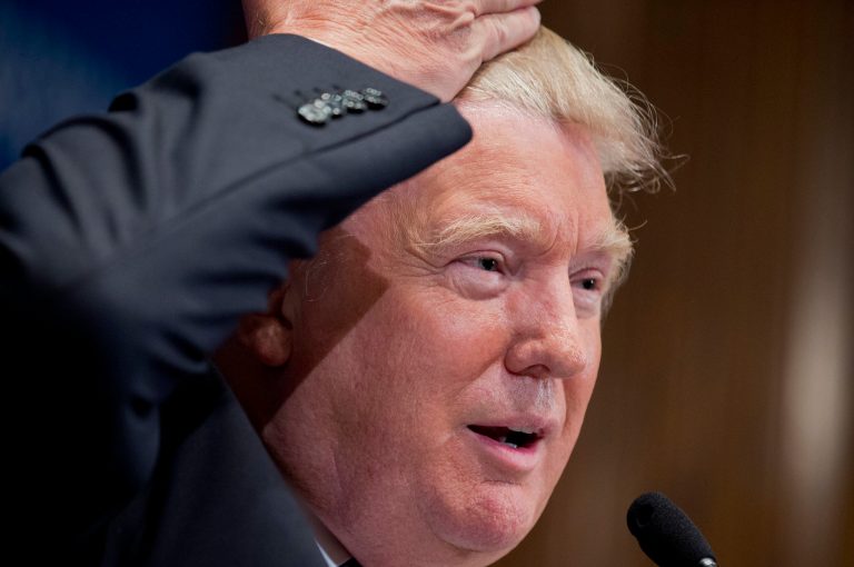 Donald Trump, chairman and president of the Trump Organization, speaks at a National Press Club luncheon in Washington, Tuesday, May 27, 2014, about 