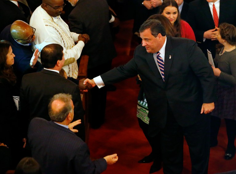 New Jersey Gov. Chris Christie shakes hands as he leaves a prayer service in celebration of his inauguration at the New Hope Baptist Church on Tuesday, Jan. 21, in Newark.(AP Photo/Rich Schultz)