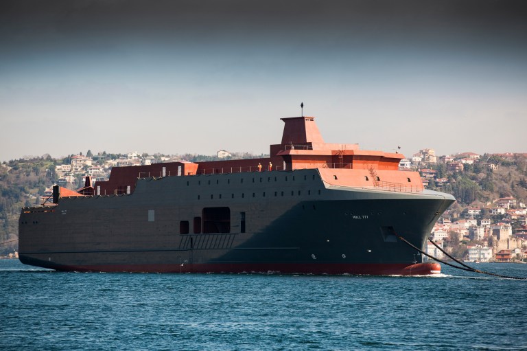 This image made available by the Norwegian Military on Thursday, June 5, 2014 shows a Norwegian vessel passing through the Bosporus in Istanbul Turkey, on March 2, 2014. The mysterious ship the size of a large passenger ferry left a Romanian wharf, glided through the narrow Bosporus that separates Europe and Asia, and plotted a course toward Scandinavia.  About a month later, at the fenced-in headquarters of Norway's military intelligence service, the country's spy chief disclosed its identity. It was a $250 million spy ship, tentatively named Marjata, that will be equipped with sensors and other technology to snoop on Russia's activities in the Arctic beginning in 2016.  (AP Photo/Norwegian Military)