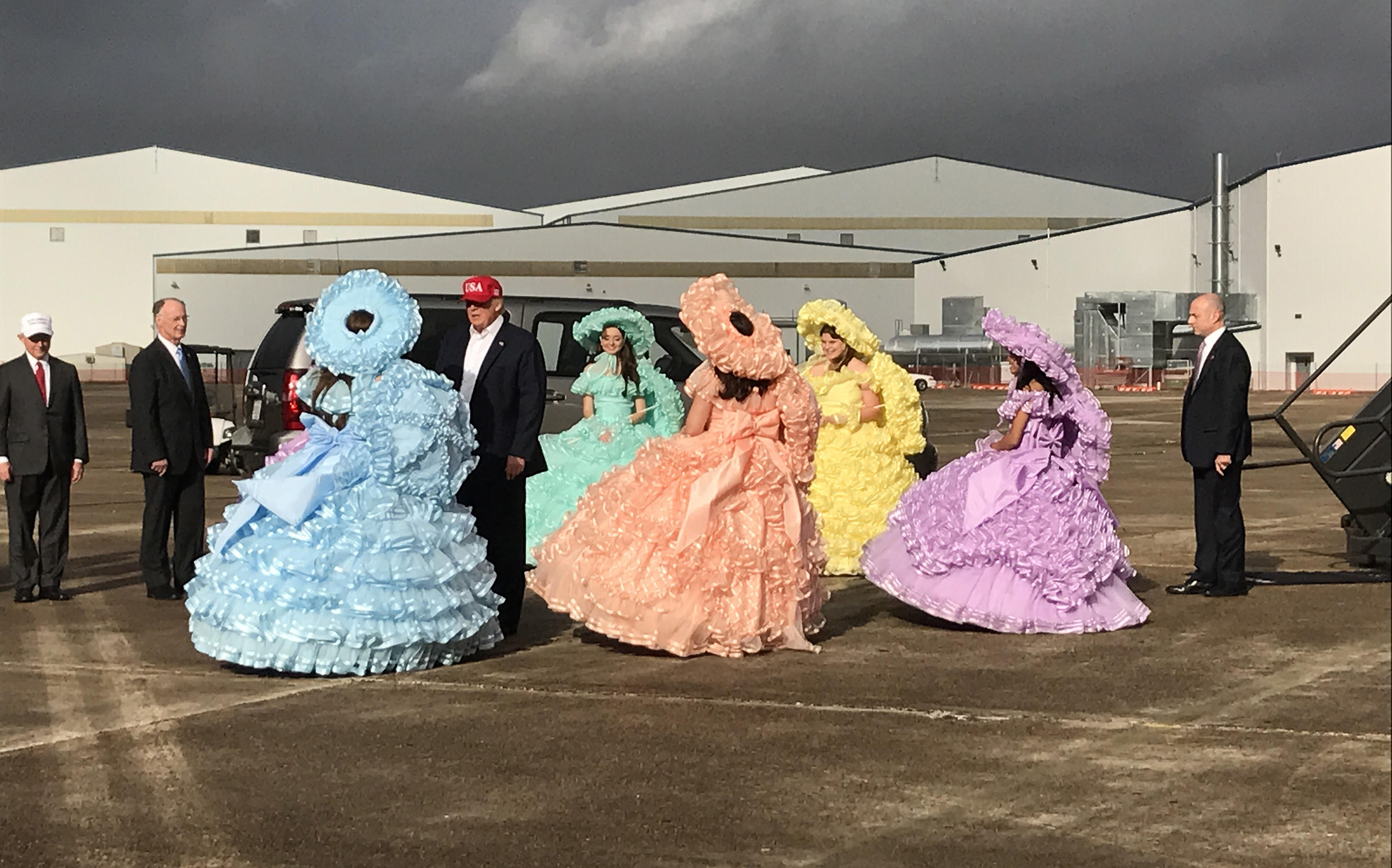 Trump greeted by Azalea Trail Maids in Alabama