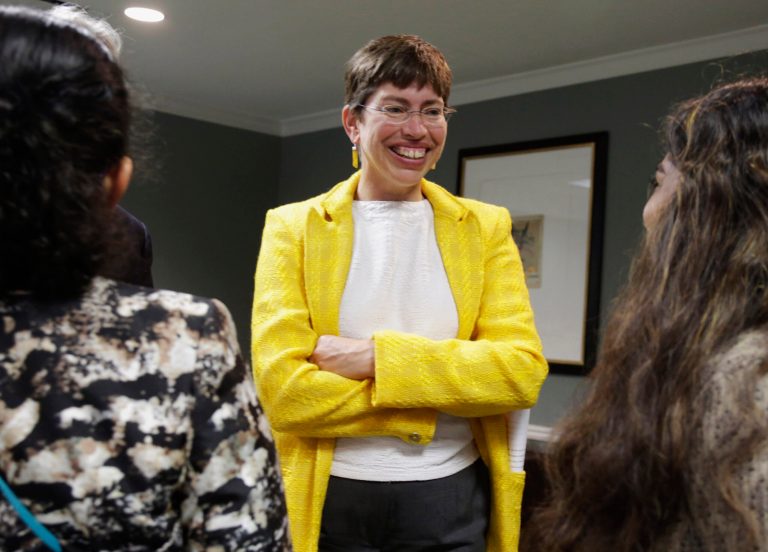 FILE - In this July 31, 2013 file photo, Illinois Lt. Gov. Sheila Simon talks with supporters before announcing her candidacy for Illinois comptroller at a news conference in Chicago. Simon faces incumbent Republican Comptroller Judy Baar Topinka in the November election.  (AP Photo/M. Spencer Green, File)