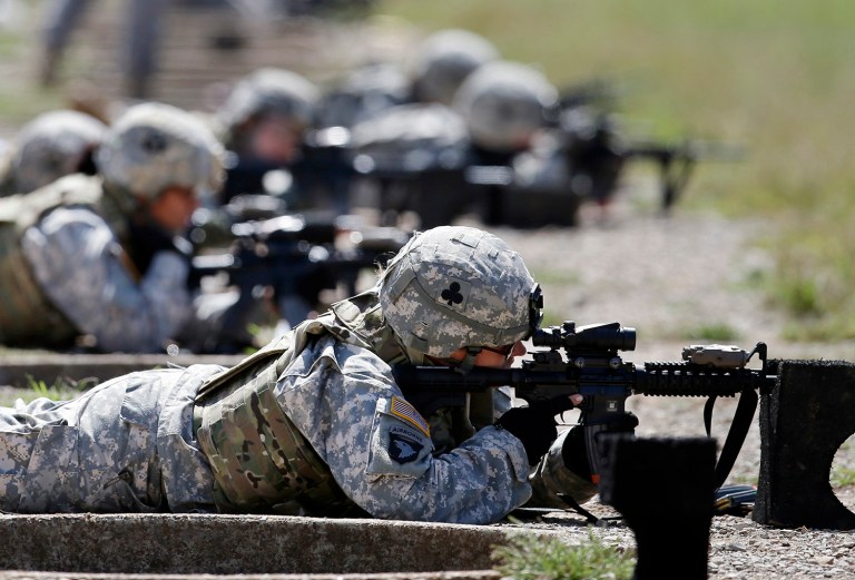 A group of male Republican senators is trying to strip out language in the Senate's defense policy bill that would require women to register for the draft. (AP Photo/Mark Humphrey, File)
