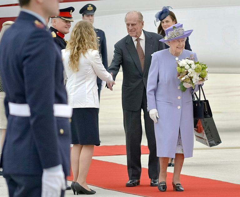 Queen Elizabeth II, accompanied by Prince Philip arrives at Rome's Ciampino military airport to start their one-day visit to Italy and the Vatican, Thursday, April 3, 2014. The British Royals will meet Italian President Giorgio Napolitano during an official lunch at the Quirinale Presidential Palace and Pope Francis at the Vatican in the afternoon. (AP Photo/Daniele Leone) Photo LaPresse 04-03-2014 Rome (Italy) News Queen Elizabeth and Prince Philip arrive at Ciampino airport