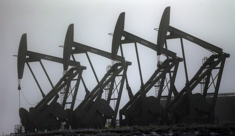 An oil drilling site. The ethanol industry prides itself on its low cost as compared with other fuel additives derived from fossil fuels as well as gasoline itself. (AP Photo/Eric Gay, File)
