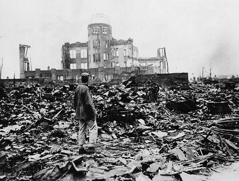 A man looks over the expanse of ruins left by the explosion of the atomic bomb on Aug. 6, 1945, in Hiroshima, Japan.