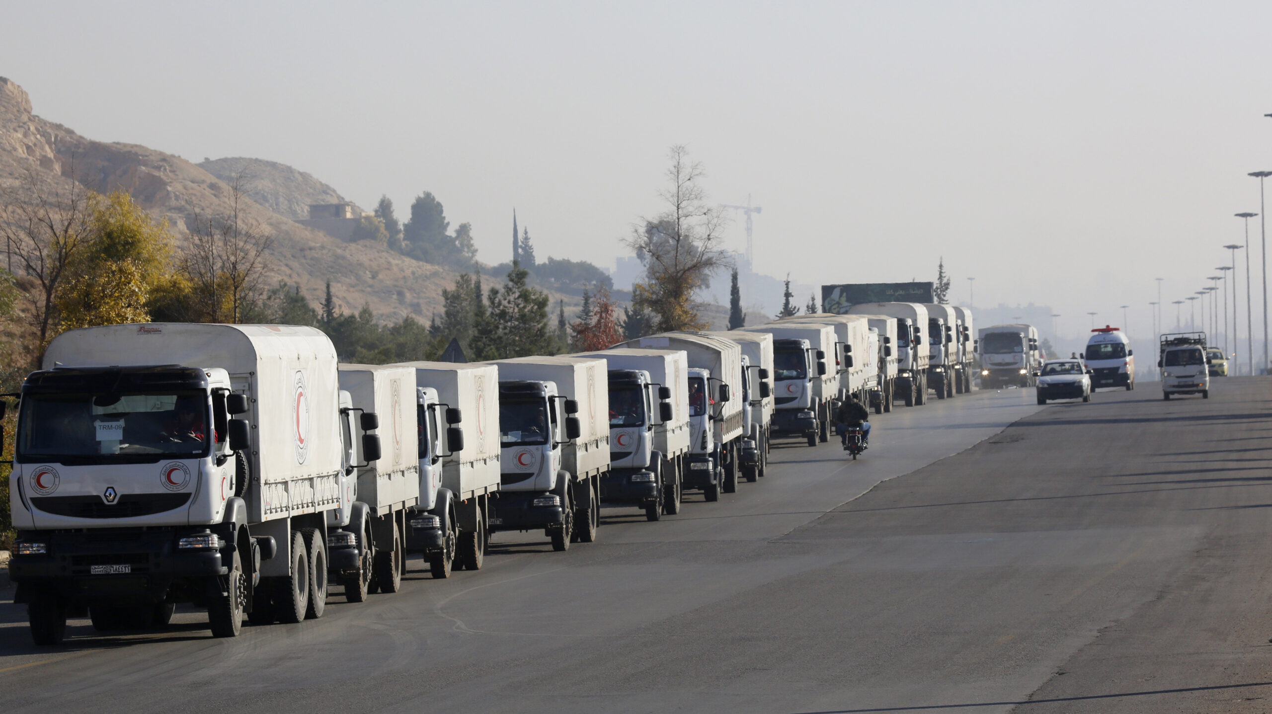 Airstrikes hit at least 18 aid trucks in Syria