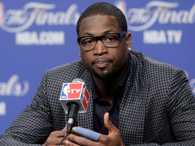   Miami Heat shooting guard Dwyane Wade participates in a news conference after Game 1 of the NBA finals basketball series against the Oklahoma City Thunder, Tuesday, June 12, 2012, in Oklahoma City. The Thunder won 105-94. (AP Photo/Sue Ogrocki)  