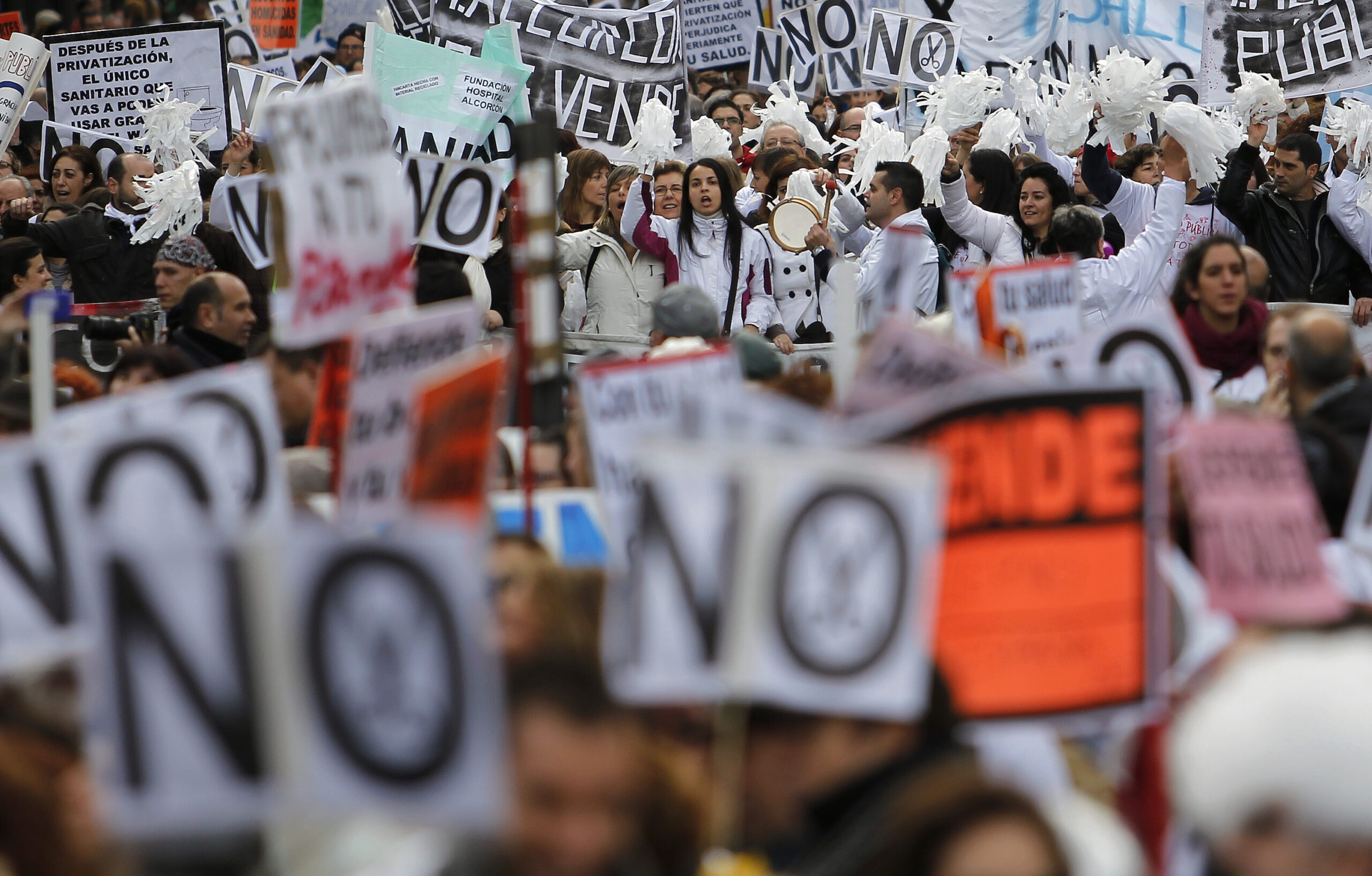 Spanish PM defends year of austerity amid protests
