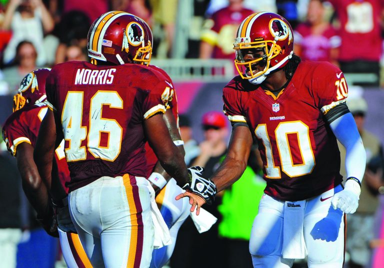 Brian Blanco/AP
With rookies Alfred Morris and Robert Griffin III leading the way in the zone read offense, the Redskins led the NFL in rushing at 169.3 yards per game and in yards per play at 6.2.