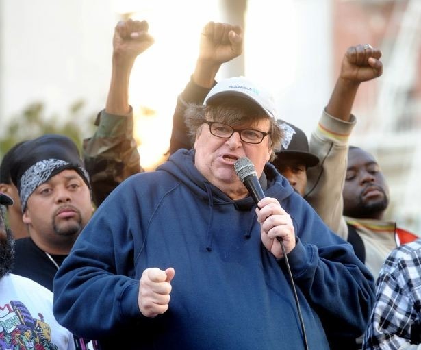 Video: Michael Moore sings Bob Dylan for Occupy CD