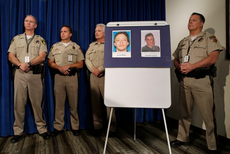 Pictures of suspects Jerad Miller and Amanda Miller are on display during a news conference, Monday, in Las Vegas. Police say two police officers, along with a bystander, were killed by Jerad and Amanda Miller yesterday. (AP Photo/John Locher)