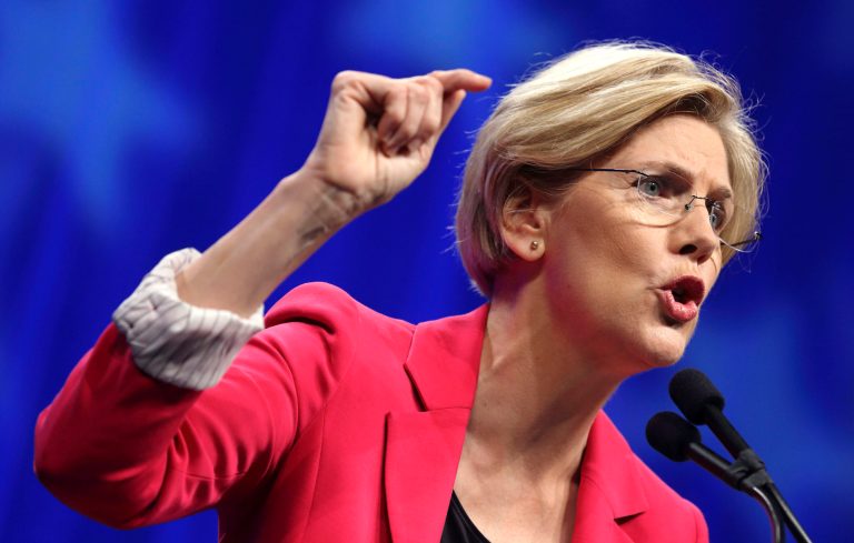   FILE - In this June 2, 2012 file photo, Massachusetts Democratic Senate candidate Elizabeth Warren speaks in Springfield, Mass. Massachusetts Sen. Scott Brown has spent weeks fanning questions about Democratic rival Elizabeth Warren's claim of Native American heritage on the campaign trail, while Warren regularly paints Brown as a darling of Wall Street. The rhetoric is sometimes caustic, and all but invisible in the ad war being waged on Massachusetts television sets. (AP Photo/Michael Dwyer, File)  
