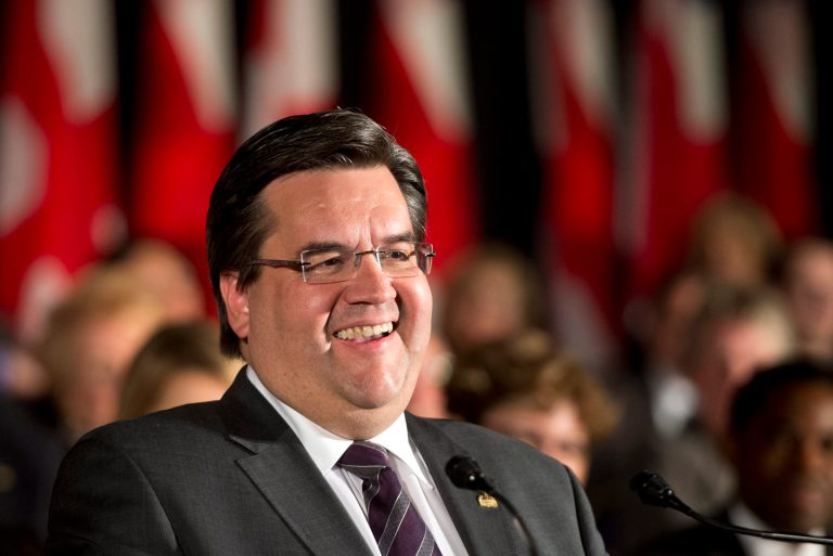FILE - In a Thursday, Nov. 14, 2013 file photo, Denis Coderre smiles after being sworn in as mayor of Montreal, in Montreal. Montreal's mayor told  New York City business leaders Tuesday, April 15, 2014 that he is looking to their city for inspiration as he fights the corruption that brought down his two predecessors. In a speech to the Manhattan Chamber of Commerce, Mayor Denis Coderre touted the recent creation of the Inspector General's office, with wide powers to investigate and suspend municipal contracts if anything suspicious is afoot.  (AP Photo/The Canadian Press, Paul Chiasson, File)