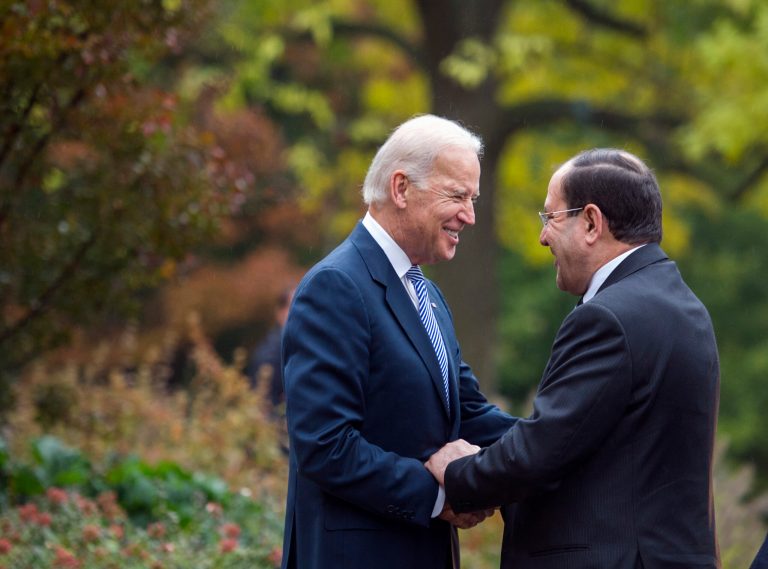 Vice President Joe Biden welcomes Iraqi Prime Minister Nouri al-Maliki for a breakfast meeting at vice president's residence, the Naval Observatory, in Washington, Wednesday, Oct. 30, 2013. President Barack Obama plans to host the prime minister at the White House on Nov. 1. (AP Photo/Cliff Owen)
