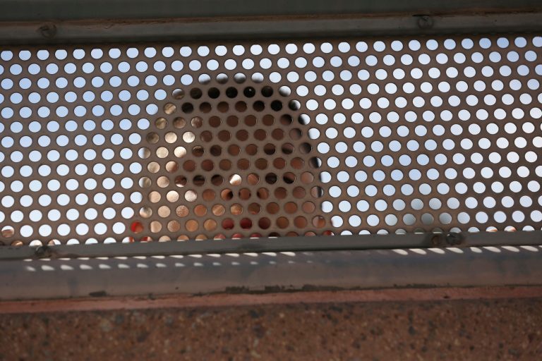A boy on the Mexican side of the U.S.-Mexico border fence peers into Arizona following a special 'Mass on the Border' on April 1, 2014 in Nogales, Ariz. (Photo by John Moore/Getty Images)
