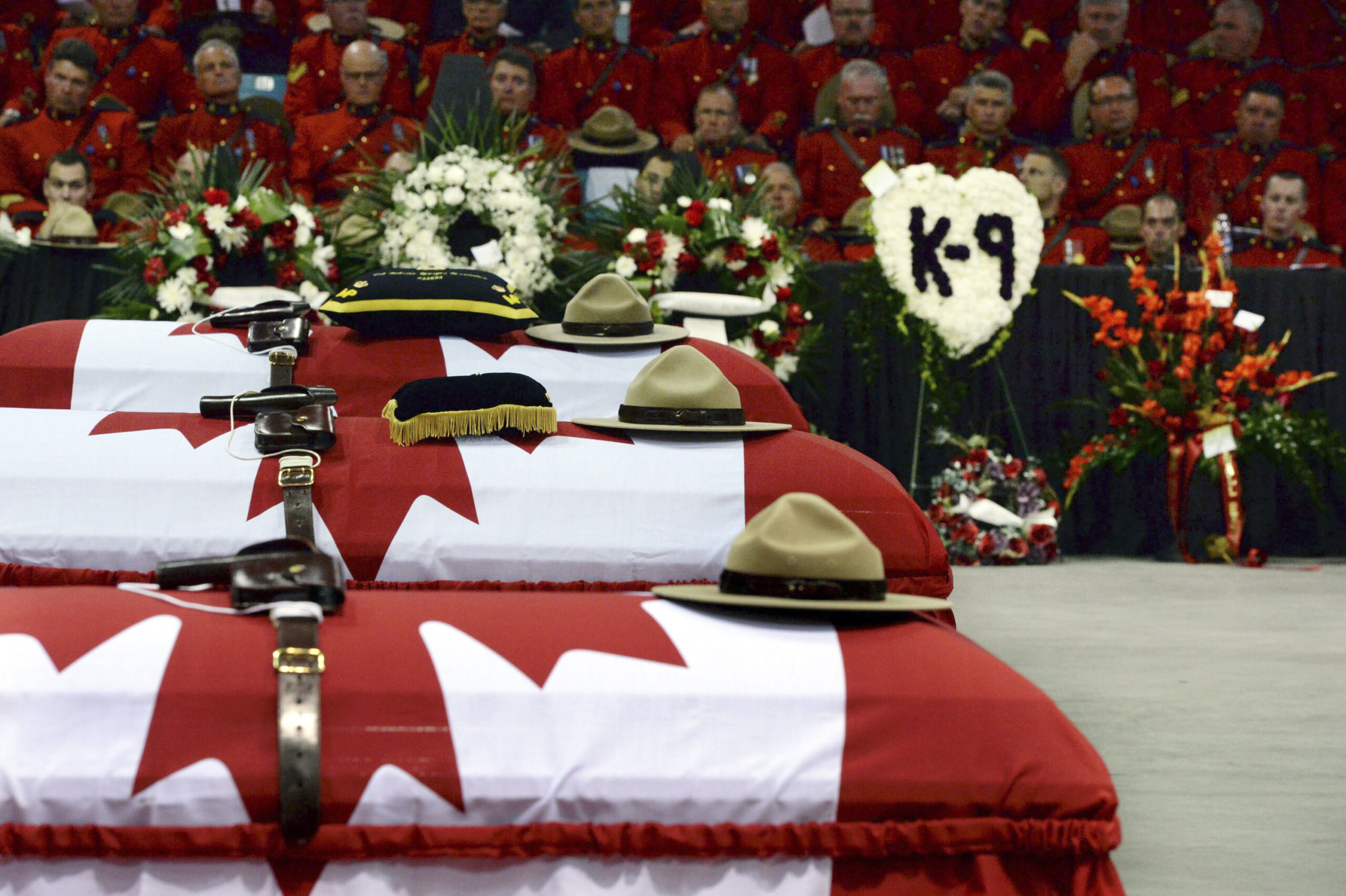 Thousands attend funeral for 3 Mounties officers