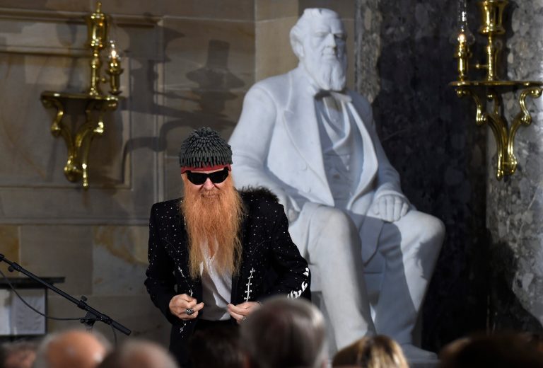 ZZ Top frontman Billy Gibbons arrives to perform during a ceremony in National Statuary Hall on Capitol Hill in Washington, Wednesday, Nov. 19, 2014, to unveil a bust of Vaclav Havel, the first president of the Czech Republic, that was dedicated. (AP Photo/Susan Walsh)