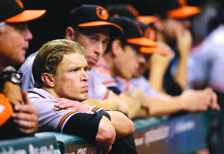 Chris O'Meara/AP
The Yankees' win meant Nate McLouth and the O's couldn't win the AL East, but Baltimore blew a chance to host the wild-card game.