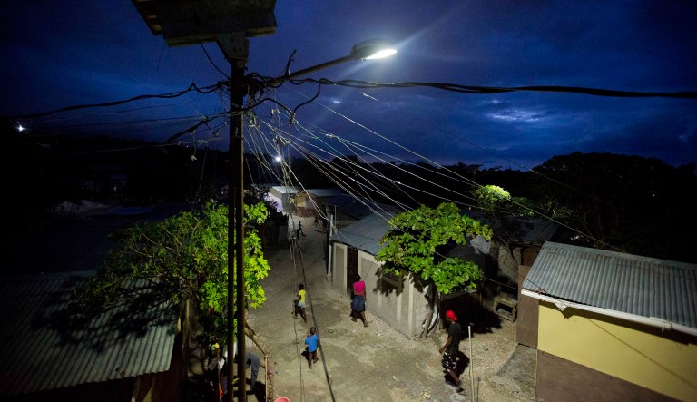 A street illuminates a section of the Caradeux refugee camp set up nearly eight years ago for people displaced by the 2010 earthquake in Haiti. Trump has denied referring to Haiti and other African nations as 
