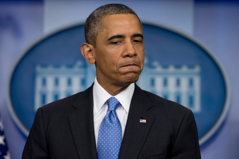 President Barack Obama pauses as he speaks during the daily news briefing at the White House, Friday, July 19, in Washington, about the fatal shooting of Trayvon Martin by George Zimmerman. (AP/Carolyn Kaster)
