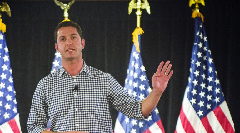 Mike Needham, CEO of Heritage Action for America, addresses an audience of supporters of the 