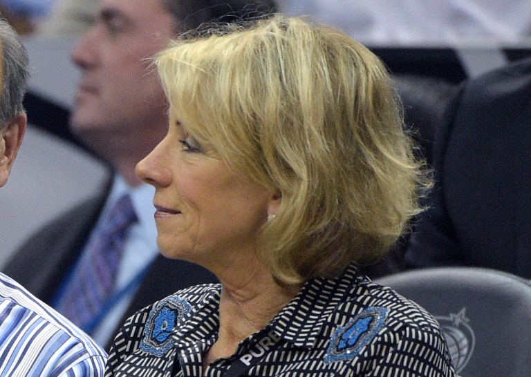 Betsy DeVos, a Michigan-based political activist who formerly served as chairwoman of the state's Republican Party, is the second woman to be appointed by Trump to a Cabinet-level role in his administration. (AP Photo/Phelan M. Ebenhack)