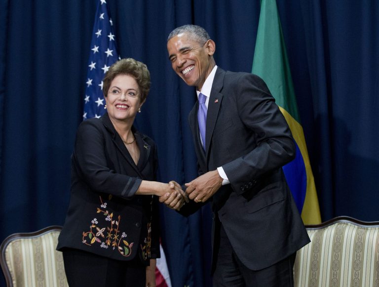 U.S. President Barack Obama, right, and Brazilian President Dilma Vana Rousseff shake hands during their bilateral meeting at the Summit of the Americas in Panama City, Panama, Saturday, April 11, 2015. (AP Photo/Pablo Martinez Monsivais)