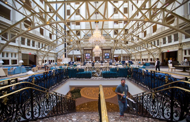 Television reporters deleted video footage on Friday of Donald Trump's new hotel in Washington, D.C., after his Friday press conference left the media feeling trolled. (AP Photo/Pablo Martinez Monsivais)